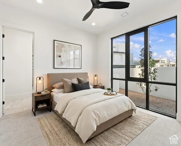 Recessed lighting, ceiling fan, and carpeted flooring