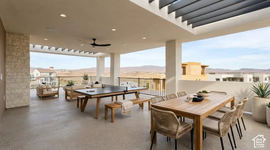 Expansive covered patio with recessed lighting and ceiling fan