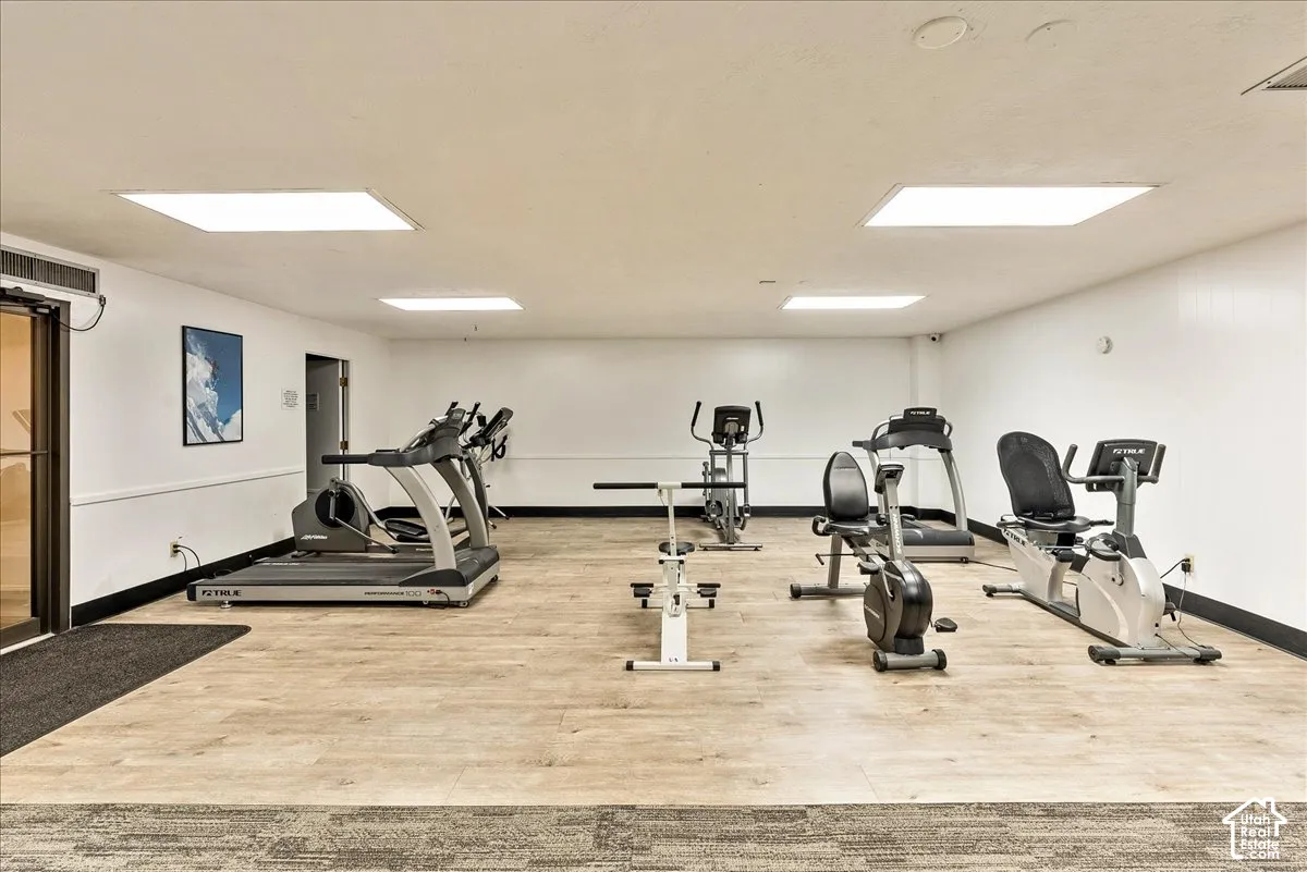 Dedicated fitness area featuring exercise equipment