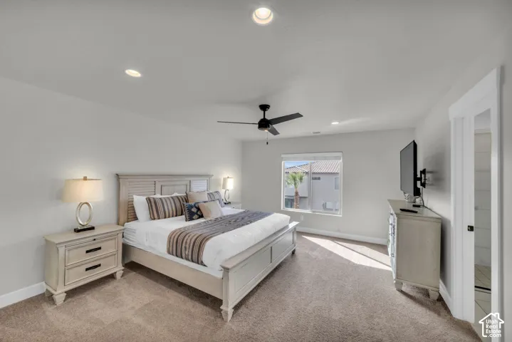 Recessed lighting, ceiling fan, and carpeted flooring