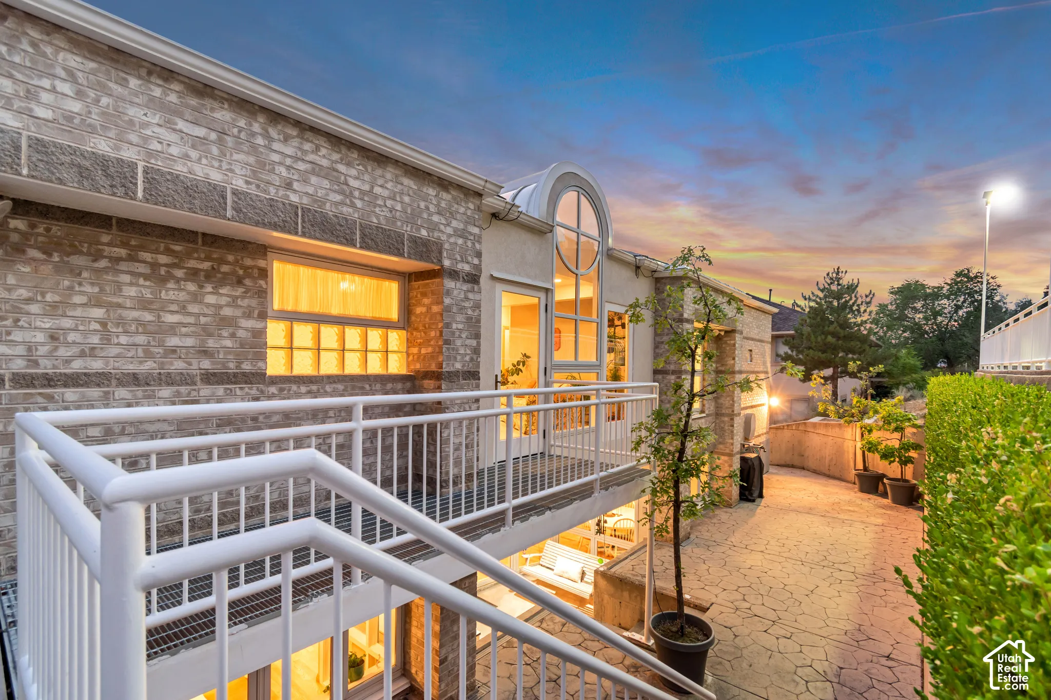 Back of property from balcony to patio