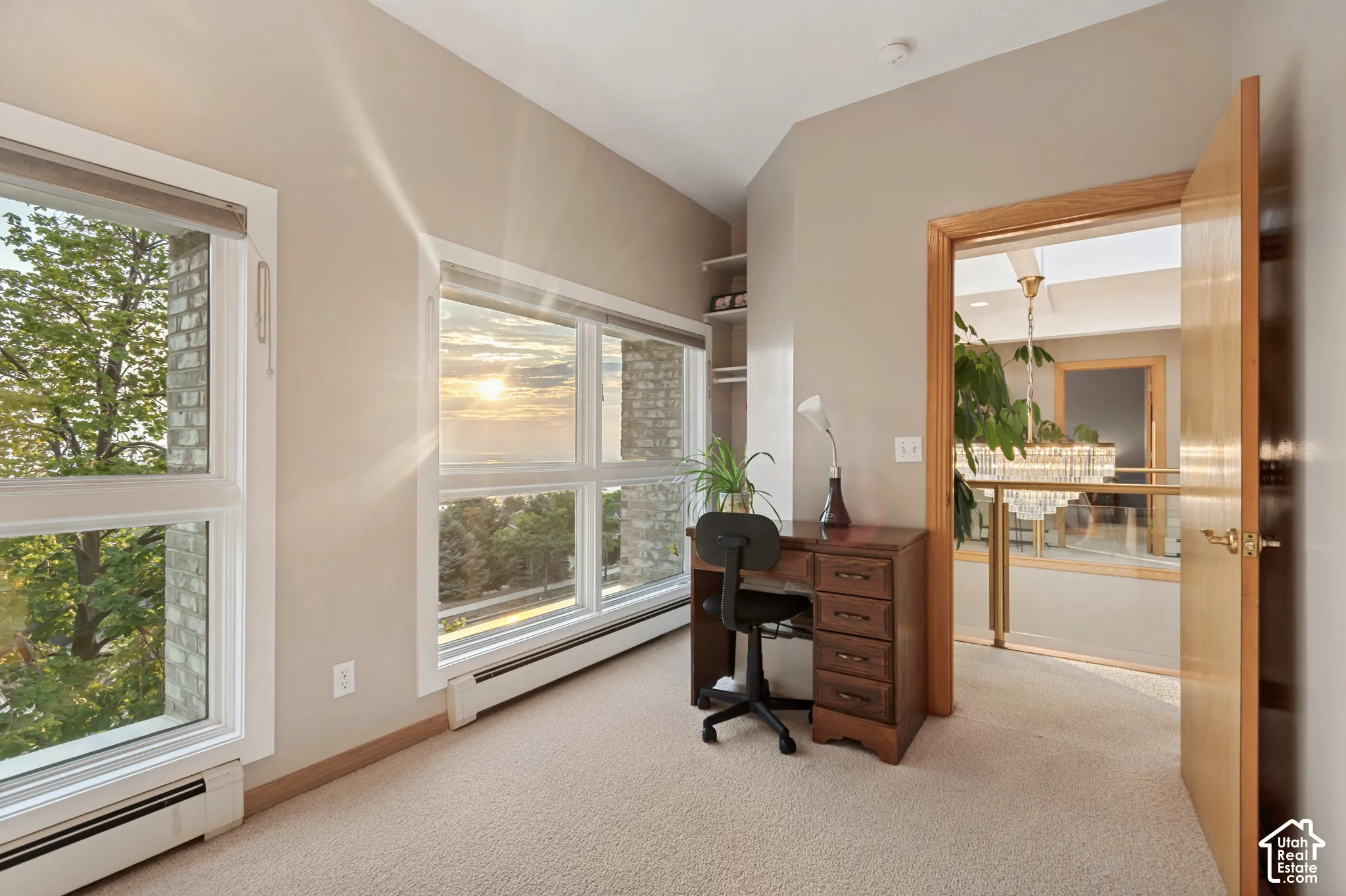 Office or bedroom with valley views out of windows.