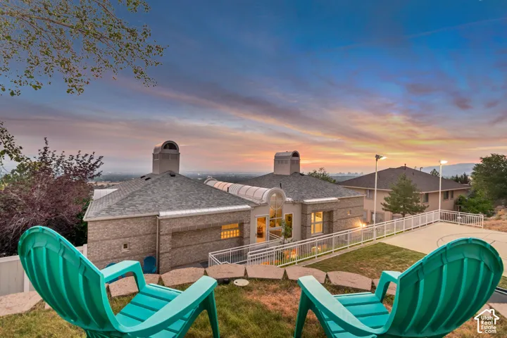 Upper terrace in backyard with valley views at twilight