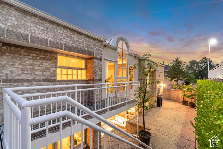 Back of property from balcony to patio
