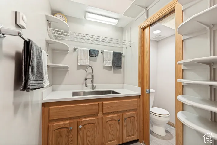 Basement bathroom with washing area