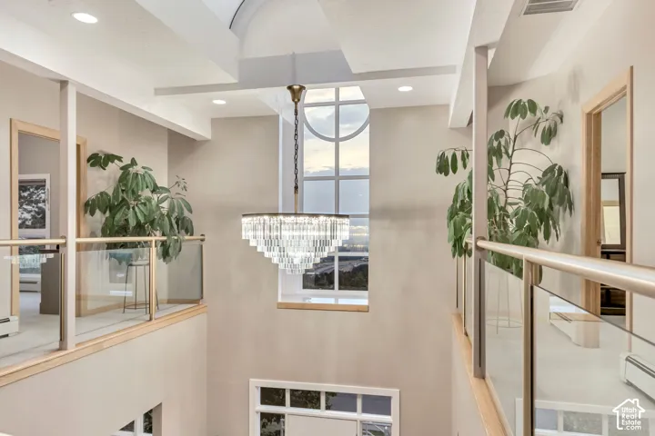 Crystal chandelier in atrium with valley views out of windows