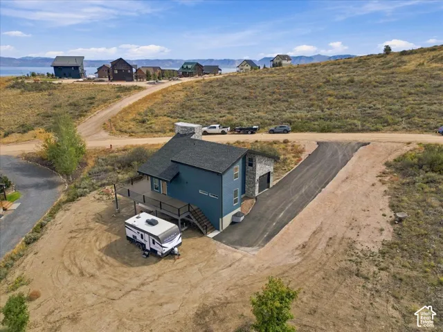 Asphalt driveway will be twice the width at showing