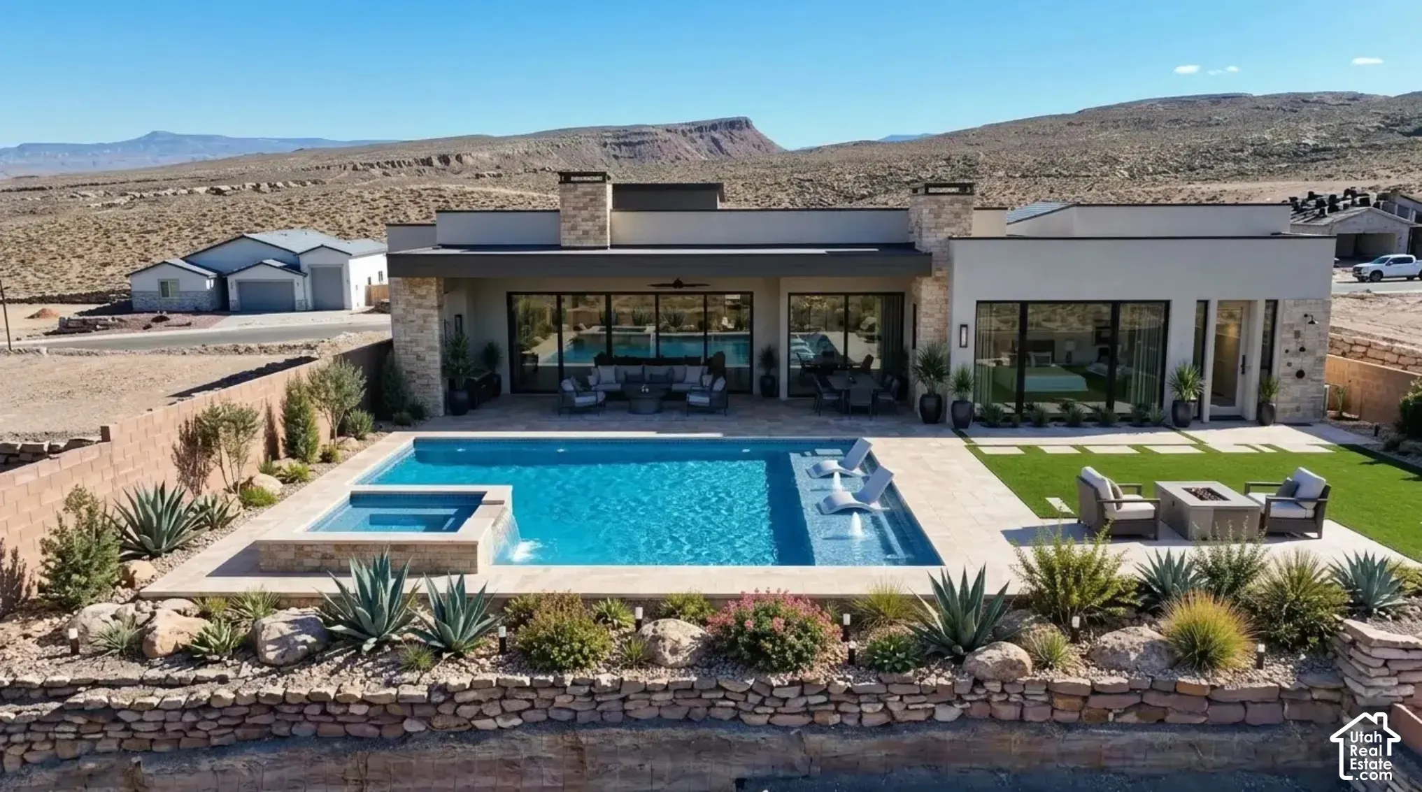 Contemporary exterior with stone and stucco finishes