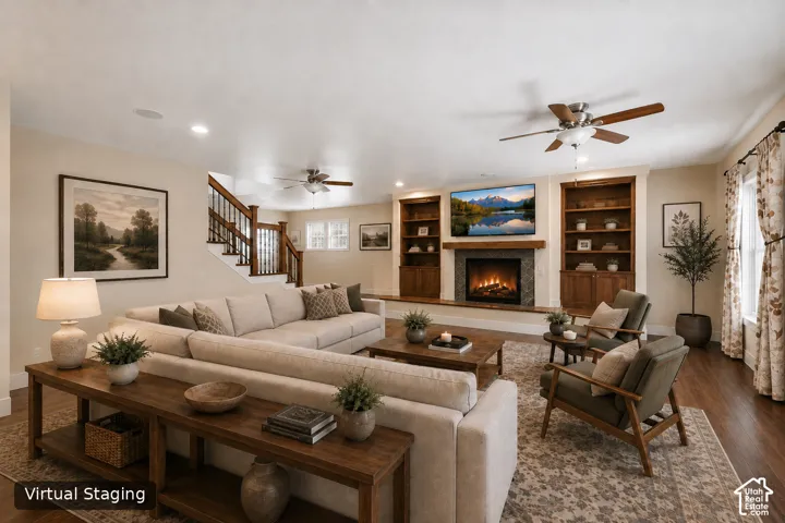 Integrated fireplace with a wood mantle and stone tile surround, flanked by built-in shelving and cabinetry