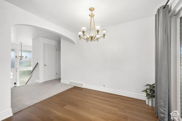 Wood-finish flooring with a contrasting carpeted area