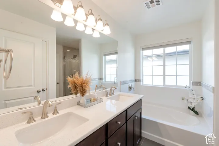 Dual vanity with undermount sinks and brushed nickel fixtures