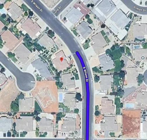 Satellite Map. Displaying the property's location and surrounding properties within the context of local streets and street names