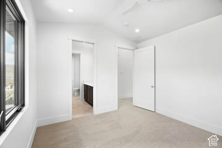 Angled ceiling with recessed lighting