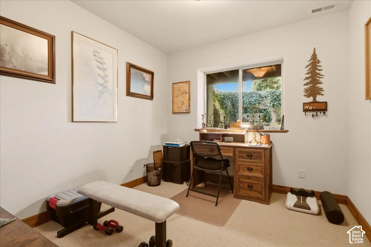 Bedroom featuring a double-pane window with lots of natural light