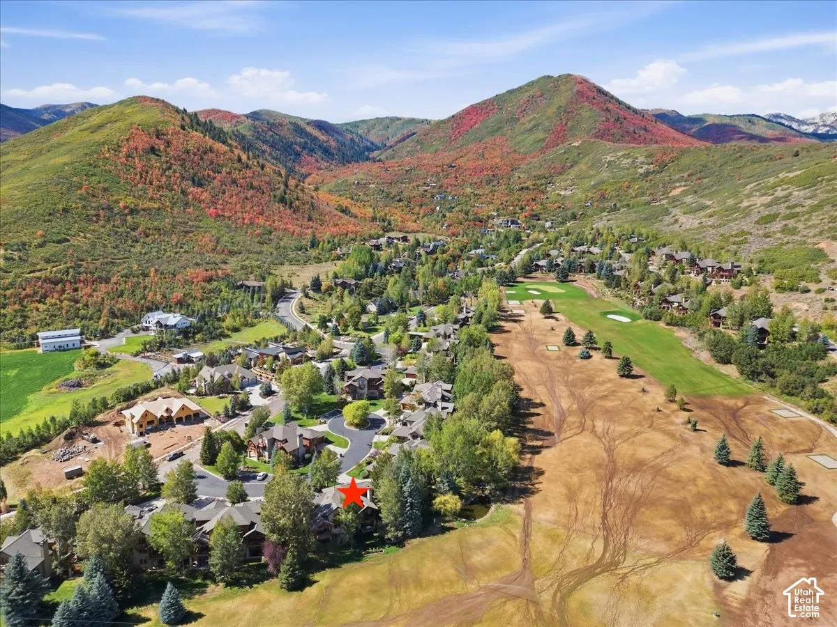 Aerial view of the landscape featuring a mountainous backdrop