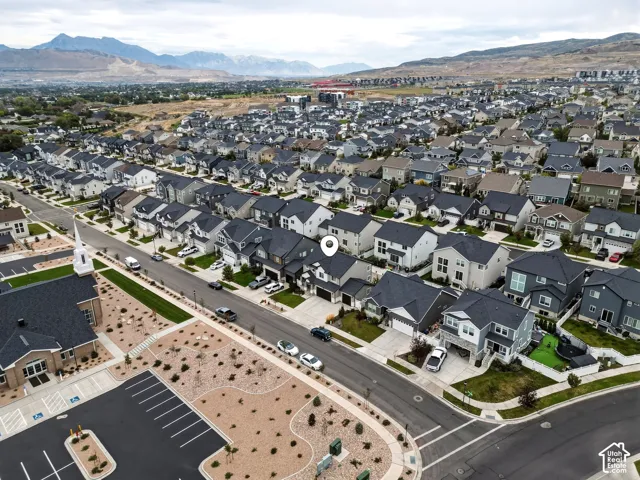 Residential community featuring uniform architectural styles and paved streets
