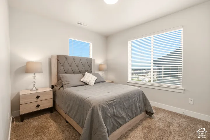 White walls with a single flush-mount ceiling light