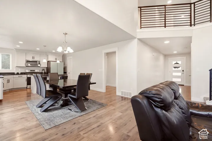 Open-concept living area with wood-finish flooring
