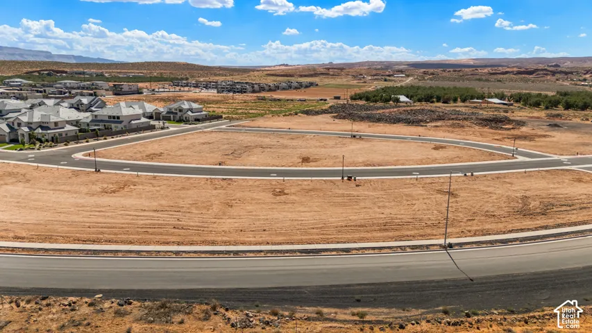 Undeveloped land with paved roads and curbs