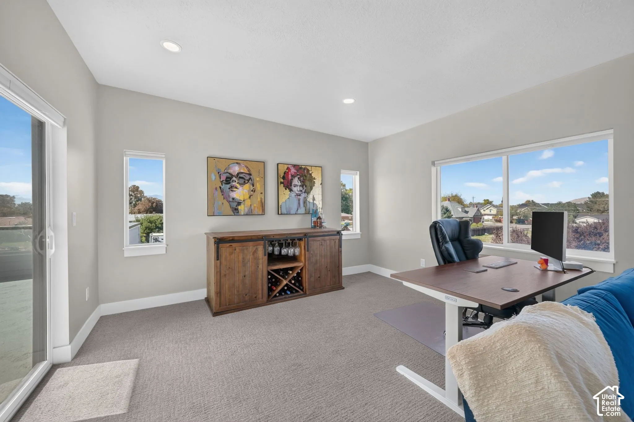 Third floor bonus room with recessed lighting, large windows, and sliding glass doors to rooftop deck