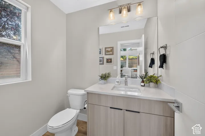 Integrated vanity and sleek design on 1st floor half-bath