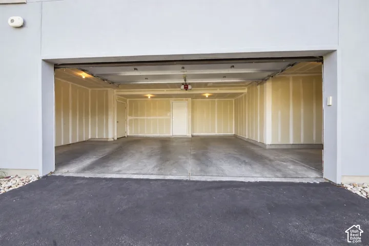 Digitally altered to remove cars and packing boxes.