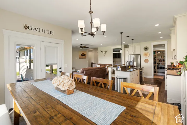 Open concept living space featuring a dining area, kitchen, and living room