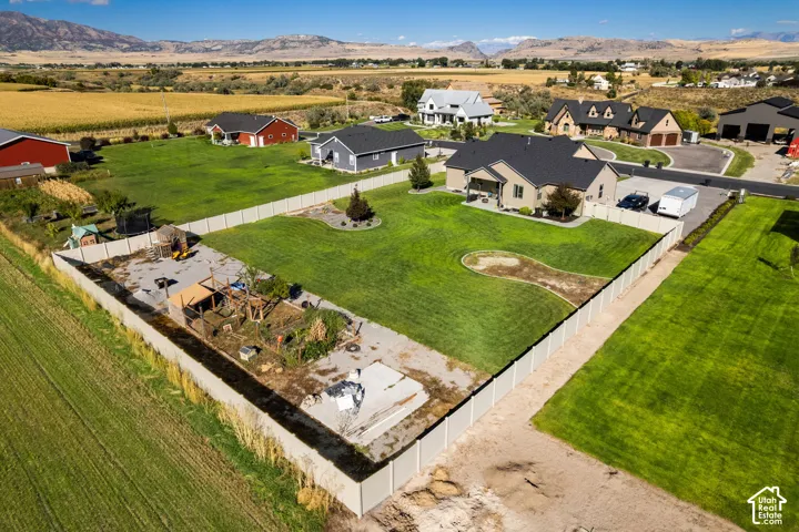 Expansive property with a large, fenced yard, offering a substantial outdoor area