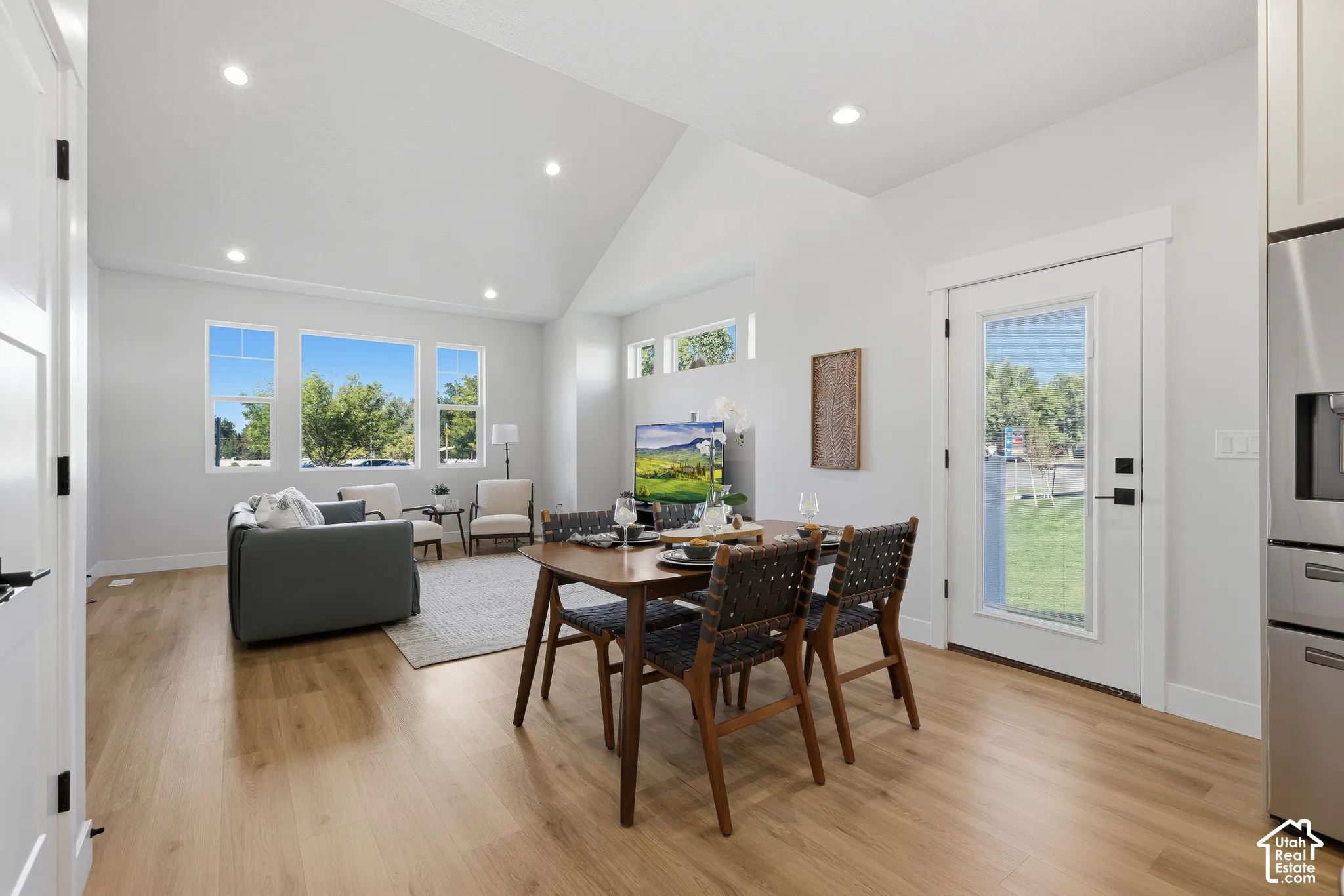 Open great room with tons of natural light, lvp flooring and plenty of room for entertaining