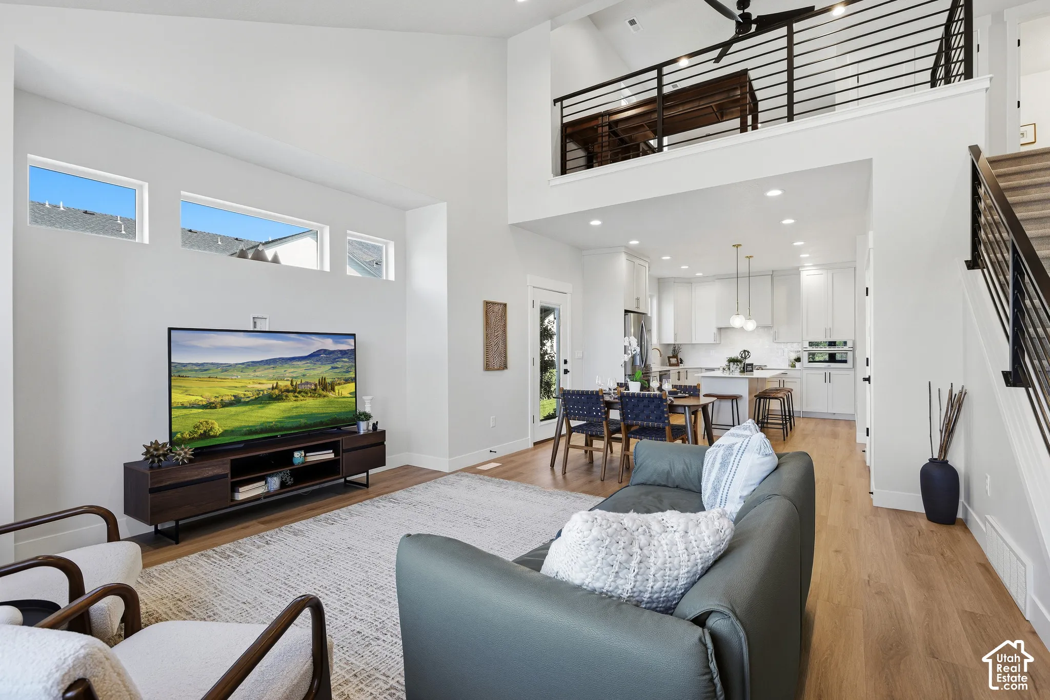 Open great room with tons of natural light, lvp flooring and plenty of room for entertaining