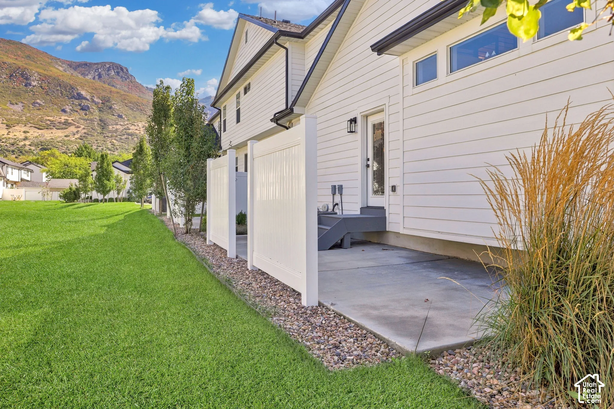 Private patio with amazing mountain view and direct access to a large grassy common area maintained by the HOA