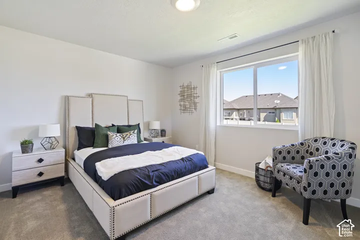 Wall-to-wall carpeting and neutral wall tones