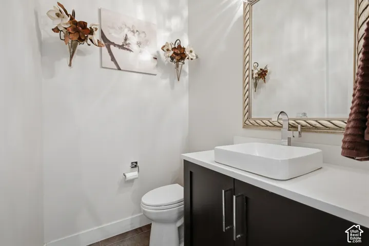 Dark wood-finish vanity with silver hardware