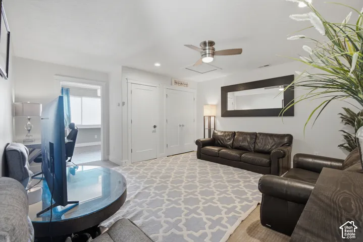 Recessed ceiling lighting, ceiling fan with integrated lighting, and white interior doors