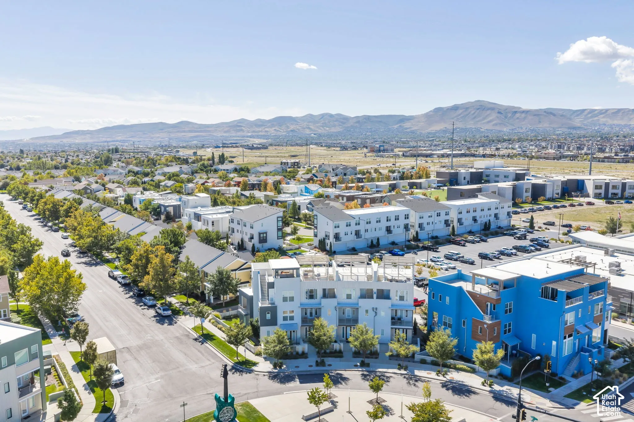 Expansive urban landscape featuring contemporary multi-story residences and commercial structures