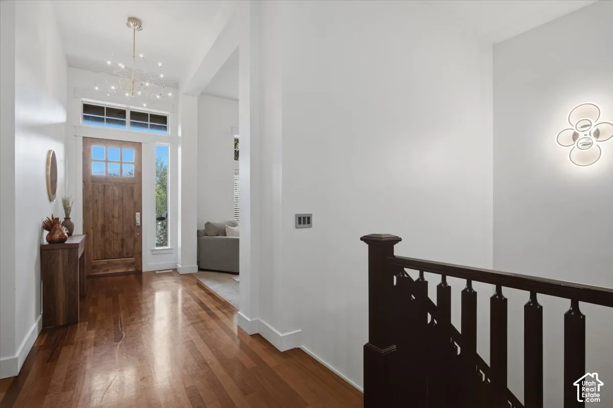 Hardwood-finish flooring throughout the entryway