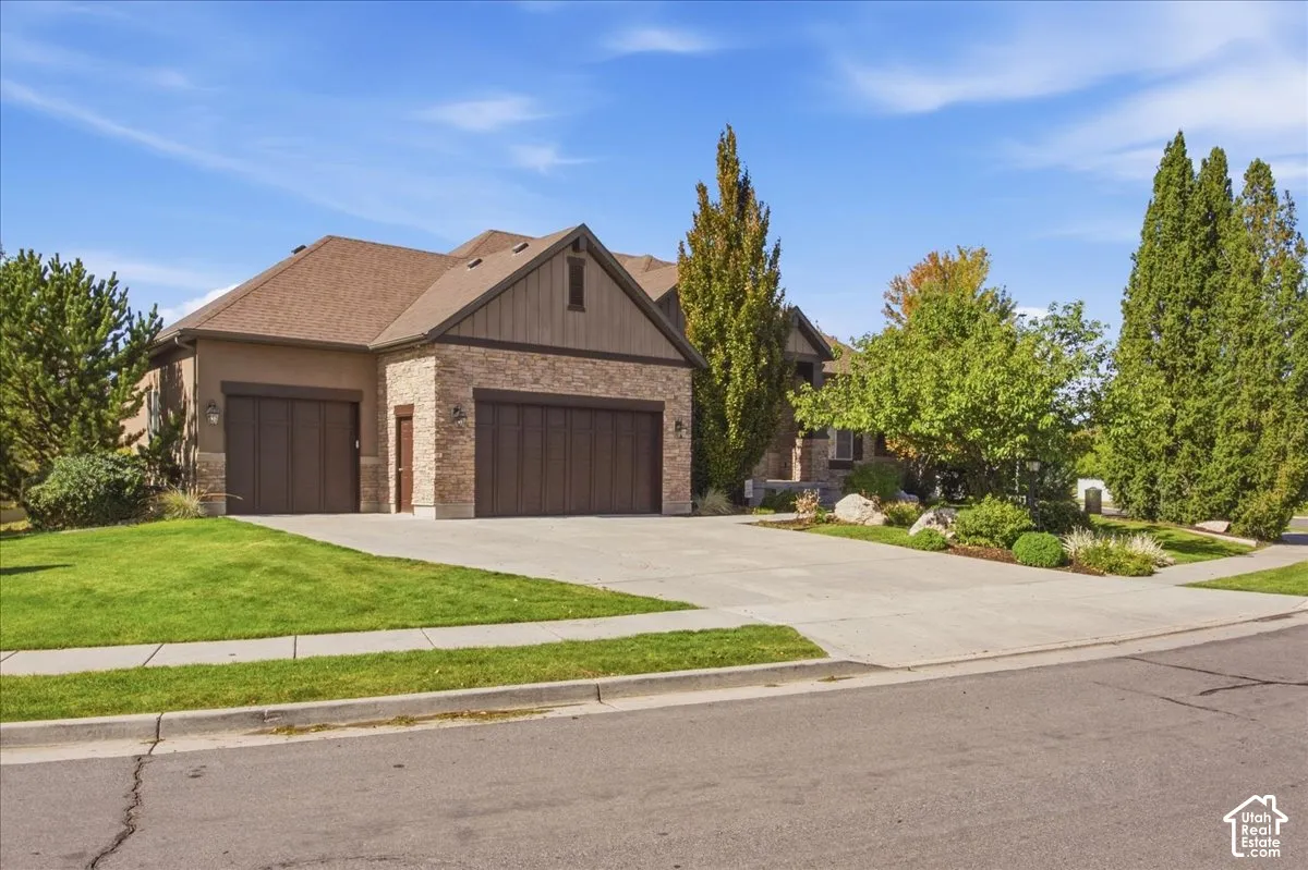 Stucco and stone exterior with board and batten accents