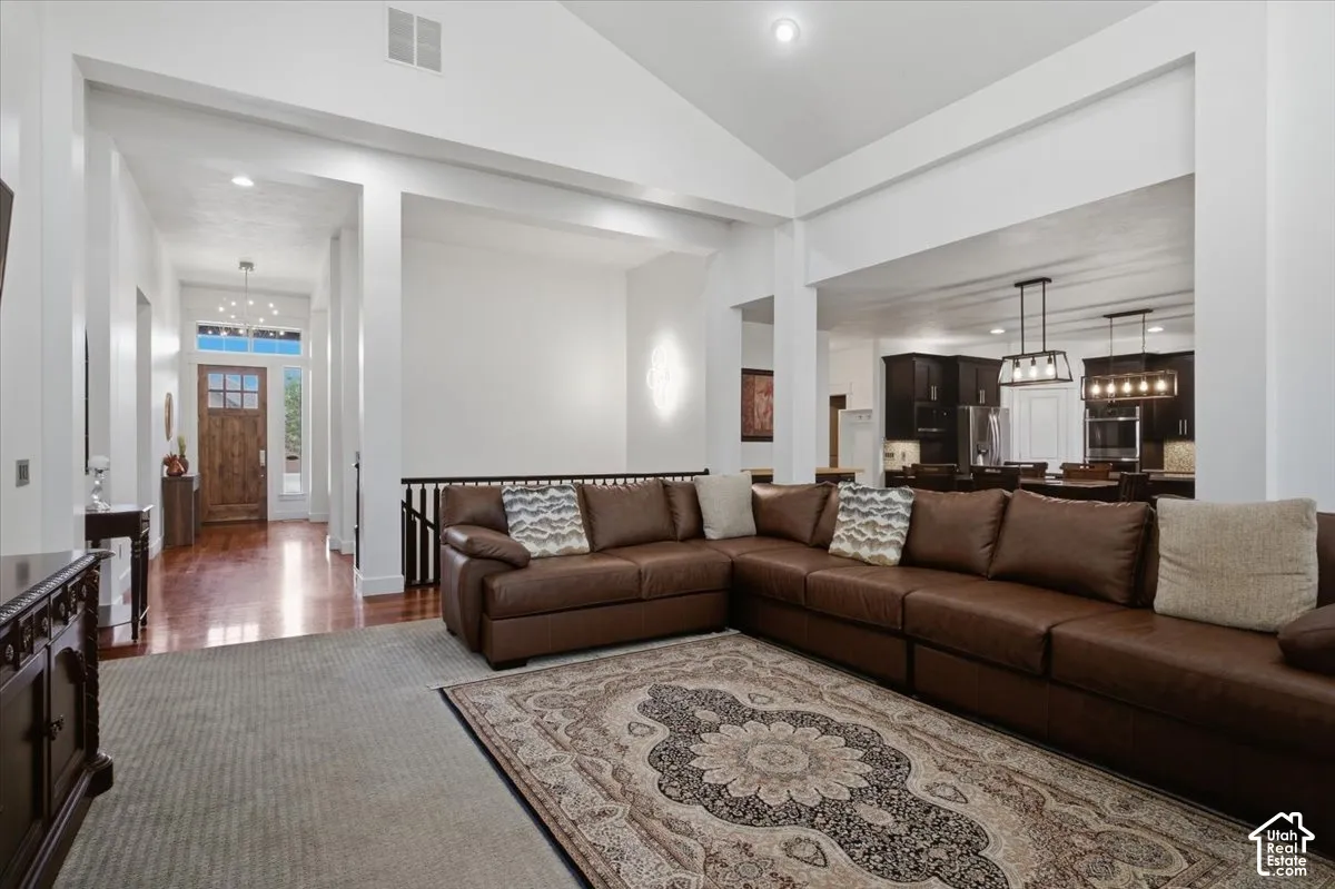 Vaulted ceilings, recessed lighting, and an open layout