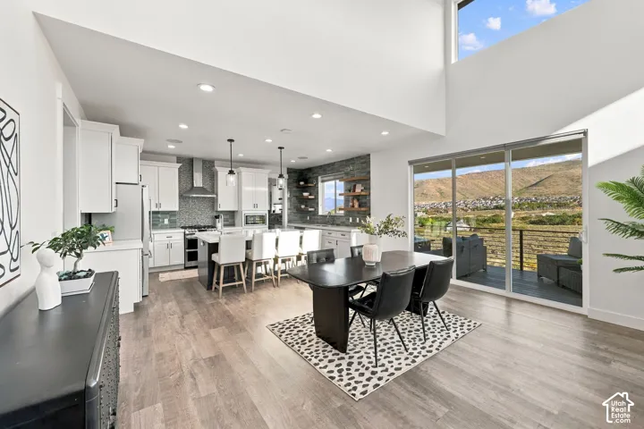 Open-concept living area with wood-finish flooring