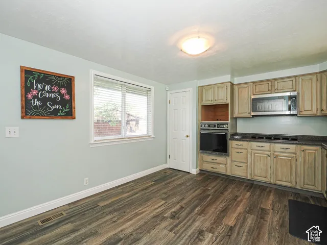 Wood-finish flooring with light-toned wall paint
