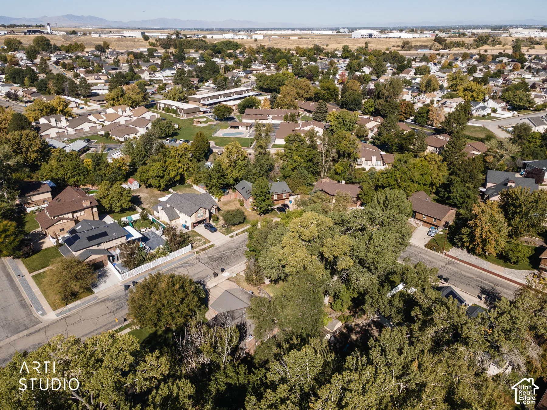 Neighborhood setting with mature trees and established residential properties