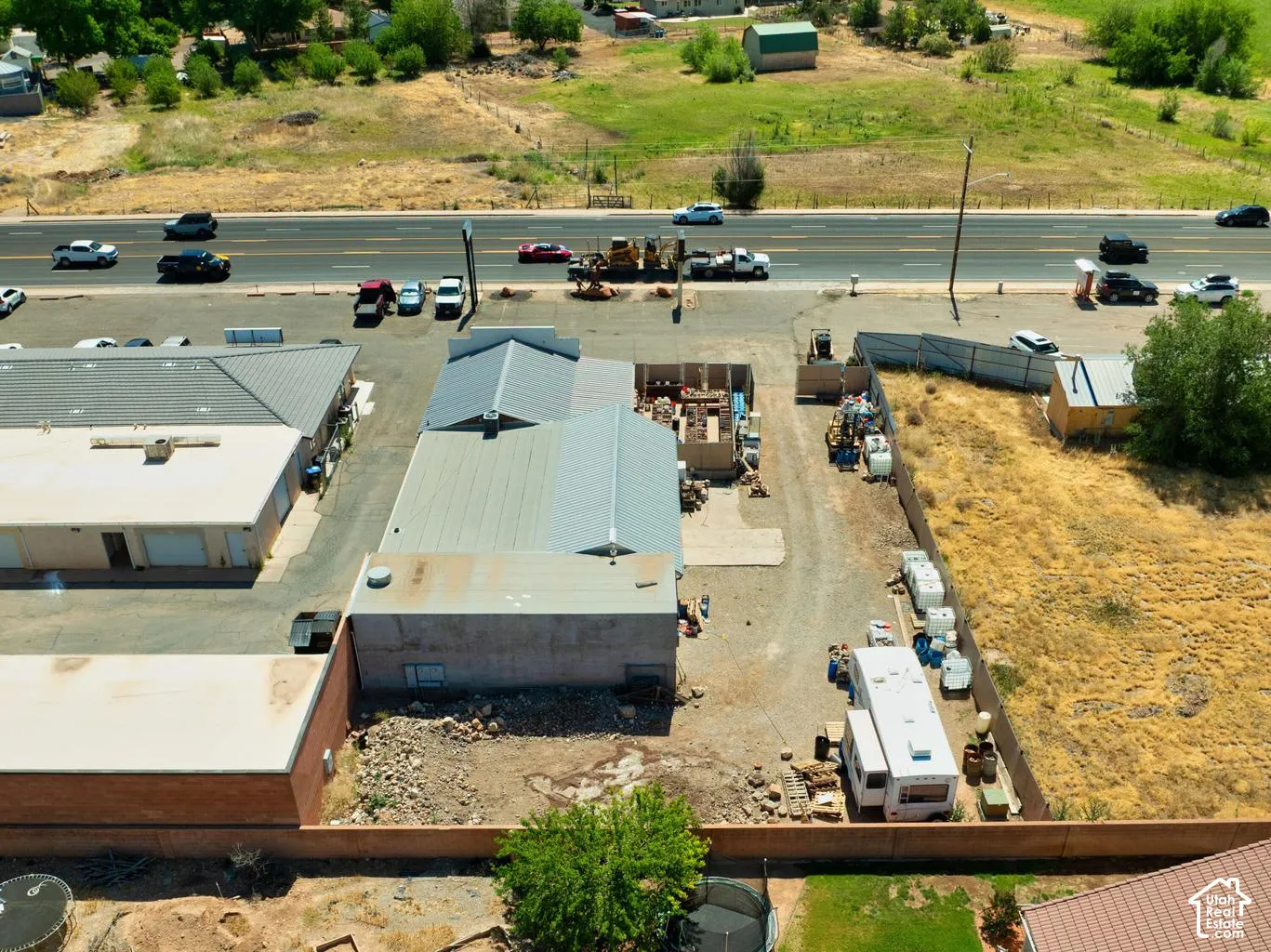 Multiple commercial-style structures featuring various rooflines