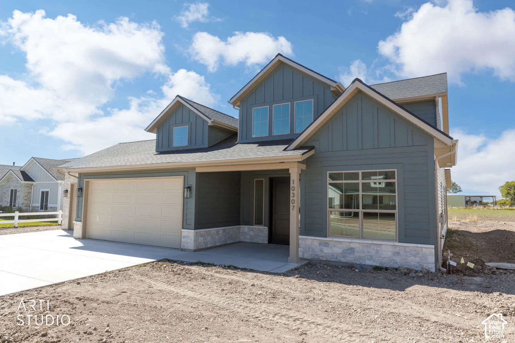 Front exterior view showcasing large windows