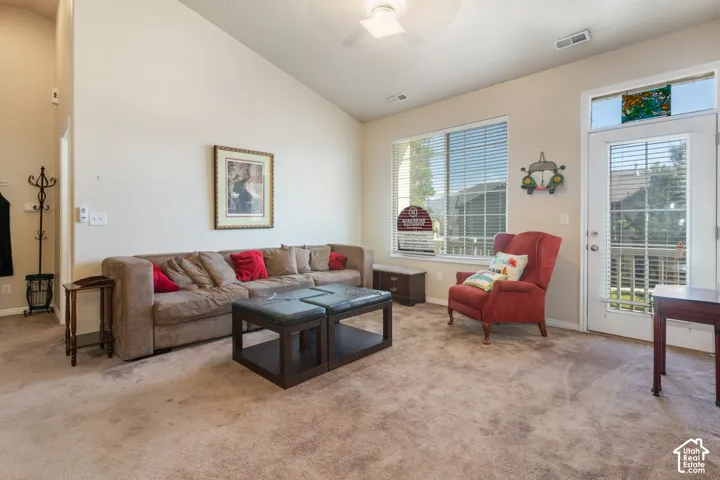 Vaulted ceiling with a ceiling fan