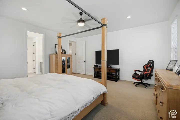 Recessed lighting, ceiling fan, carpeted flooring, and white walls