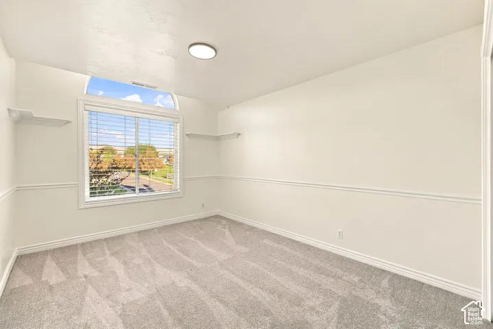 Light-toned wall finish with decorative trim