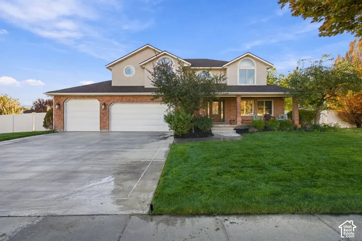 Two-story exterior with brick and stucco finishes