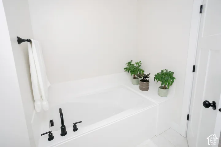 Built-in soaking tub with matte black fixtures