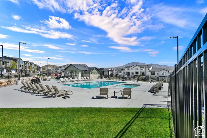 Poolside relaxation, recreation, and gathering spaces just steps from home