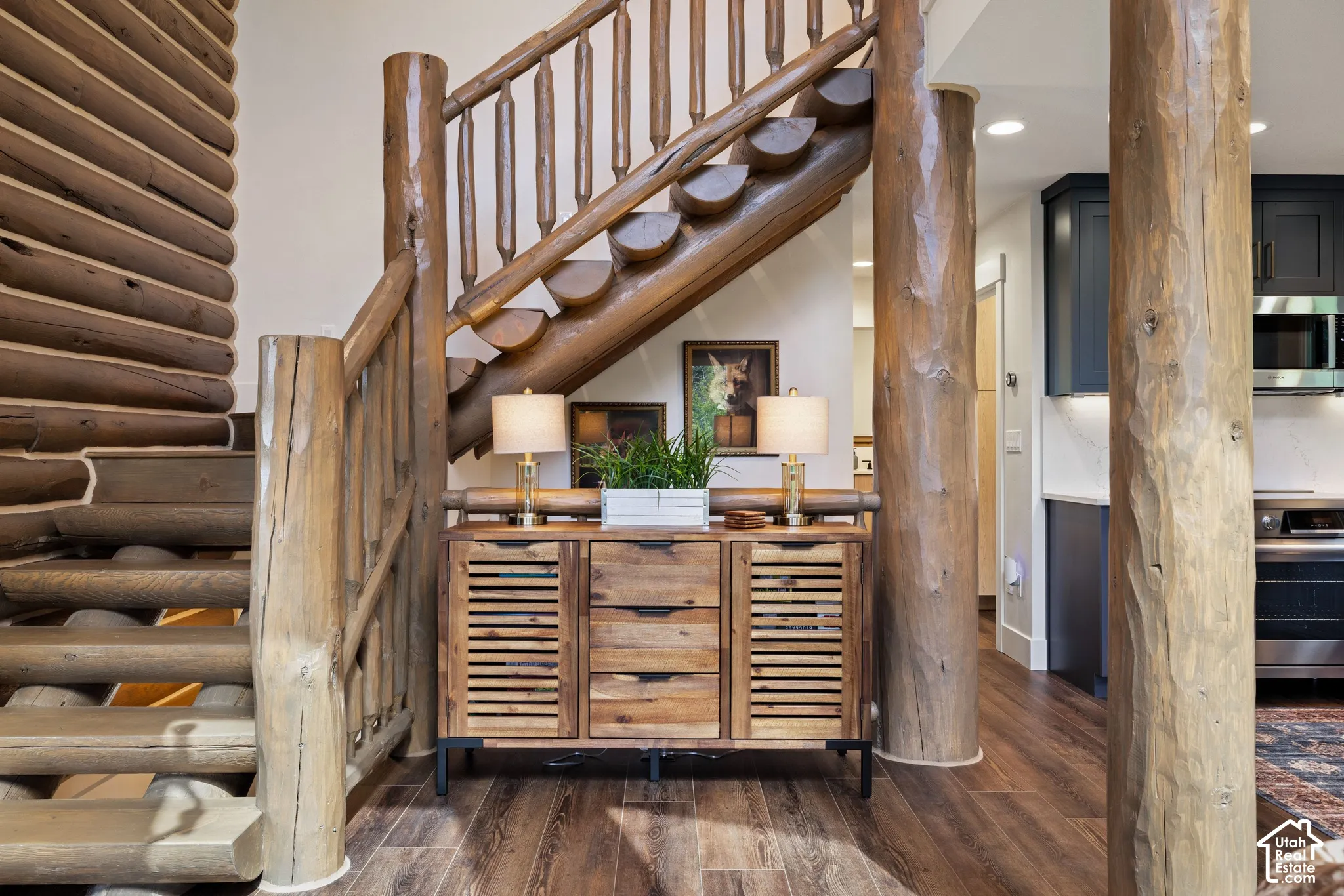 Log staircase and structural wood columns